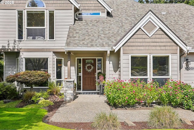 view of front of property with a shingled roof