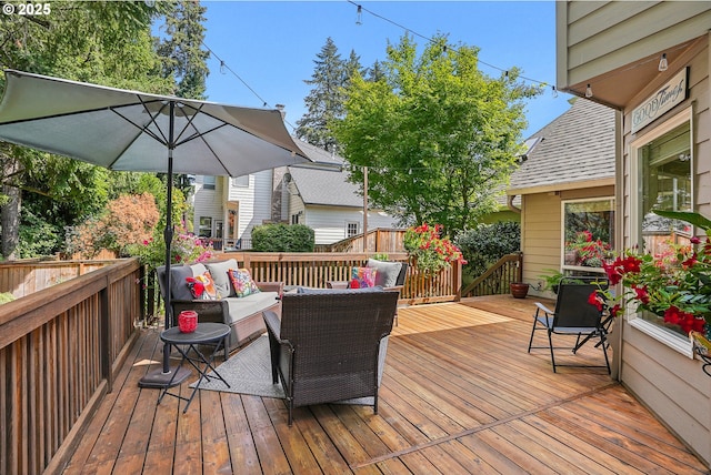 deck with outdoor lounge area
