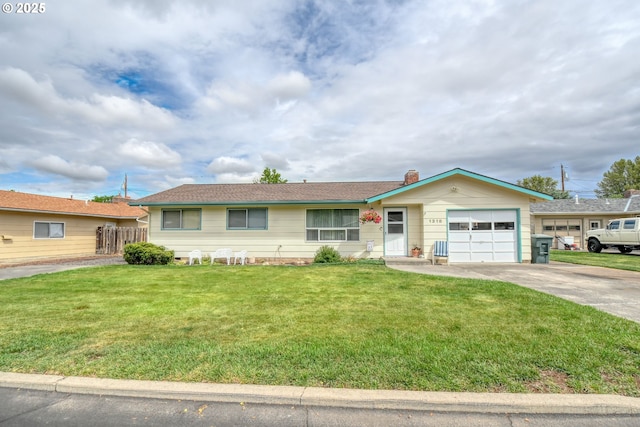 1318 SW 39th Ave, Pendleton, OR 97801 - ranch-style home with a garage, concrete driveway, a front yard, and a chimney