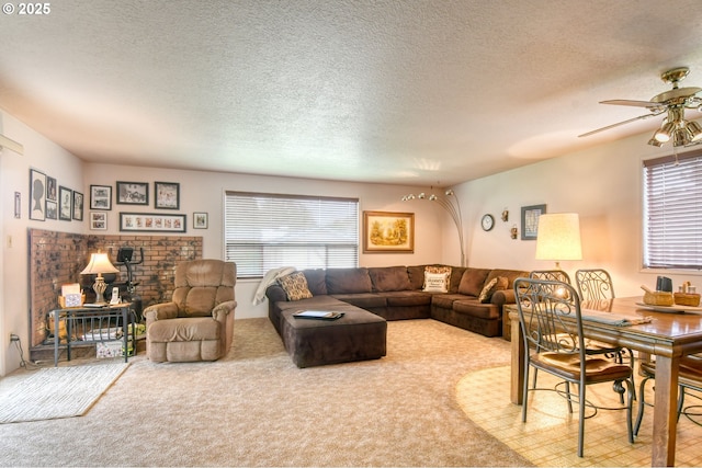 1318 SW 39th Ave, Pendleton, OR 97801 - living area with plenty of natural light, a ceiling fan, carpet flooring, a textured ceiling, and a wood stove