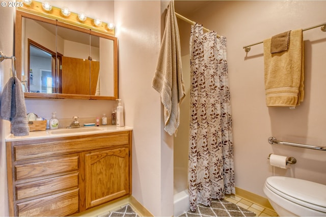 1318 SW 39th Ave, Pendleton, OR 97801 - full bathroom featuring toilet, vanity, a shower with curtain, tile patterned floors, and baseboards