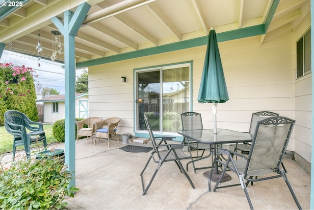 1318 SW 39th Ave, Pendleton, OR 97801 - view of patio with outdoor dining space, an outbuilding, and a shed