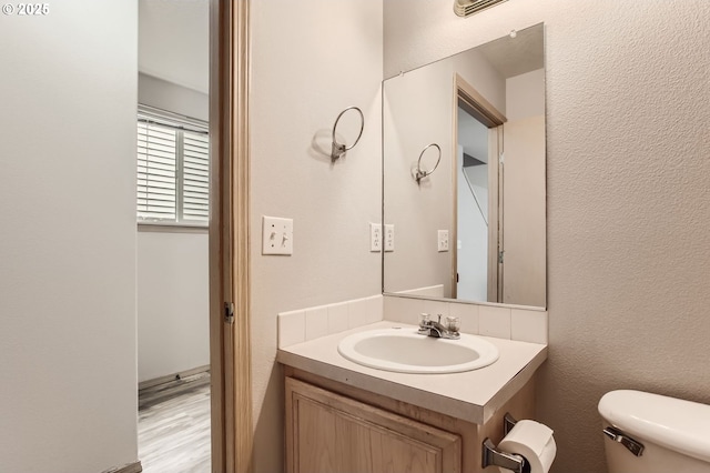 1165 SE 85th Ave, Portland, OR 97216 - bathroom with vanity and wood finished floors