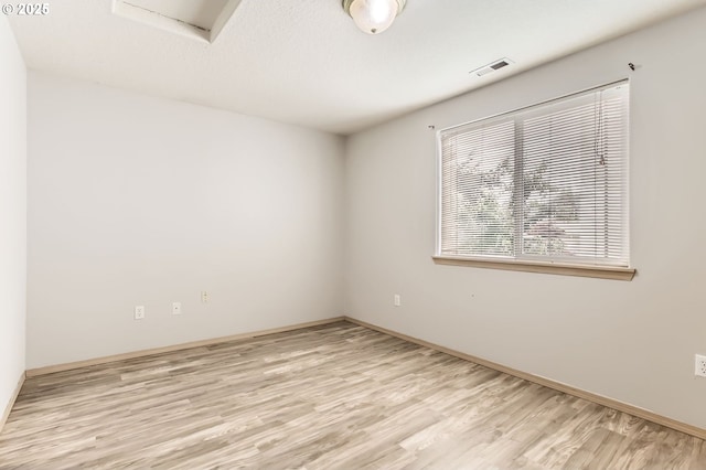 1165 SE 85th Ave, Portland, OR 97216 - unfurnished room featuring light wood-style flooring and baseboards