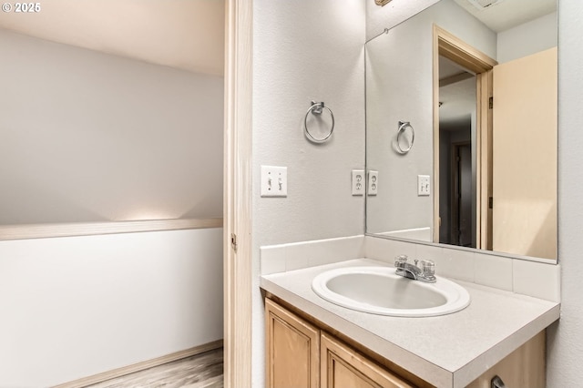 1165 SE 85th Ave, Portland, OR 97216 - bathroom featuring vanity and wood finished floors
