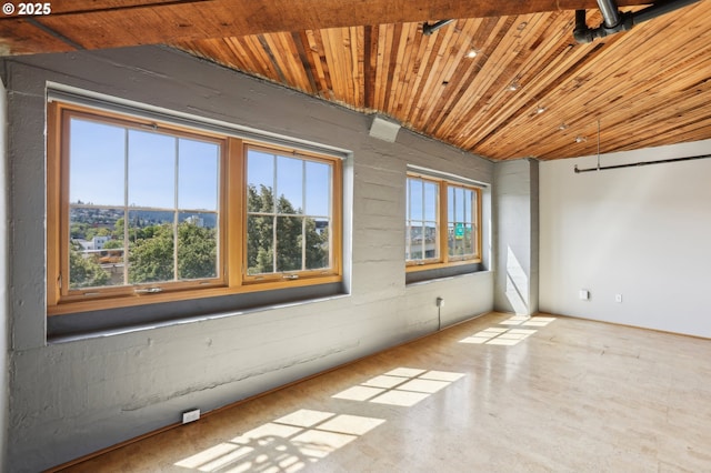 1420 NW Lovejoy St Unit 518, Portland, OR 97209 - unfurnished room with wooden ceiling