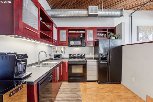 kitchen with sink and black appliances