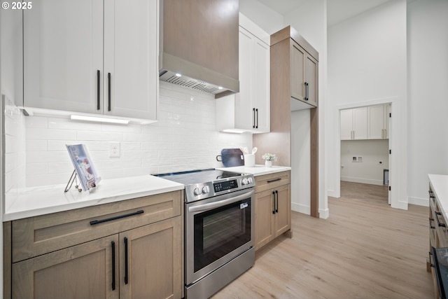 5404 NE 111th St, Vancouver, WA 98686 - kitchen featuring stainless steel electric range, light countertops, and light wood finished floors