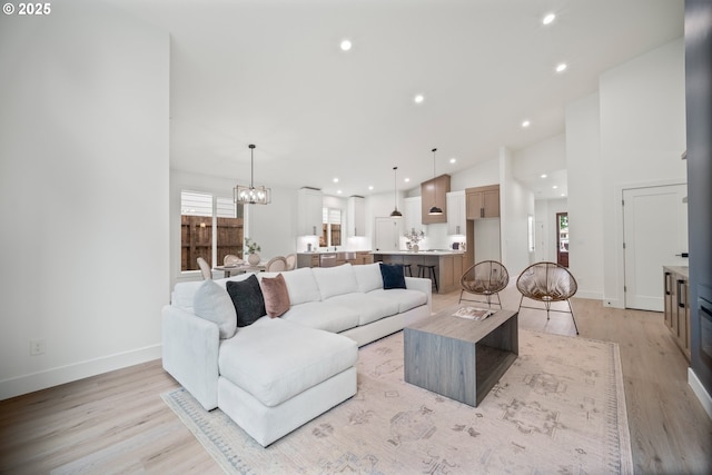 5404 NE 111th St, Vancouver, WA 98686 - living room with a chandelier, light wood-type flooring, lofted ceiling, and recessed lighting
