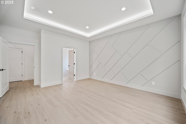 5404 NE 111th St, Vancouver, WA 98686 - unfurnished room with a raised ceiling, light wood-type flooring, recessed lighting, and a smoke detector
