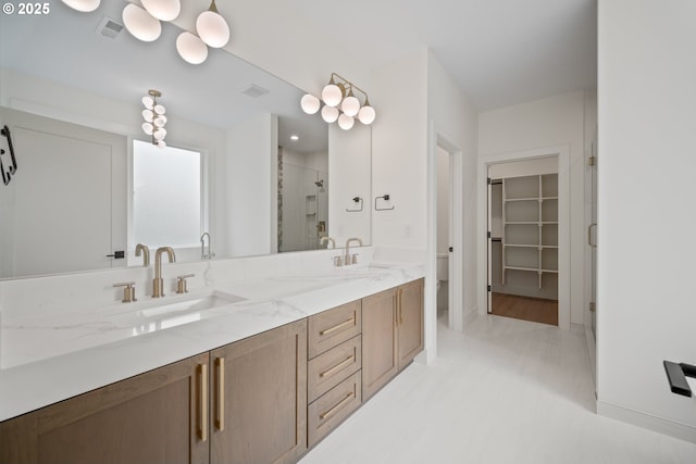 5404 NE 111th St, Vancouver, WA 98686 - bathroom with a shower stall, double vanity, and a spacious closet