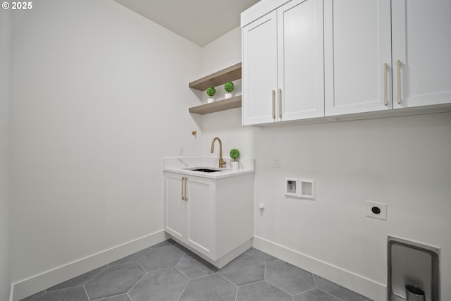 5404 NE 111th St, Vancouver, WA 98686 - laundry room with electric dryer hookup, cabinet space, gas dryer hookup, washer hookup, and light tile patterned floors