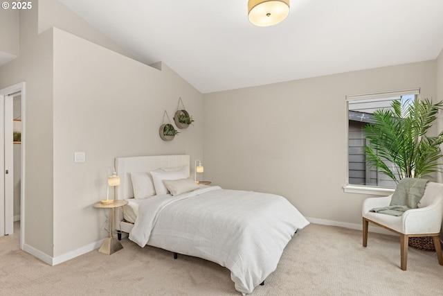 5026 SE Mill St, Portland, OR 97215 - bedroom featuring light carpet, baseboards, and lofted ceiling