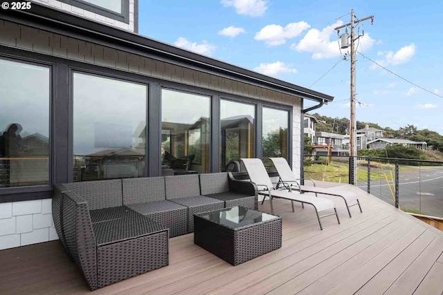 wooden deck with an outdoor hangout area