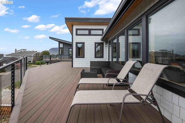 deck with outdoor lounge area