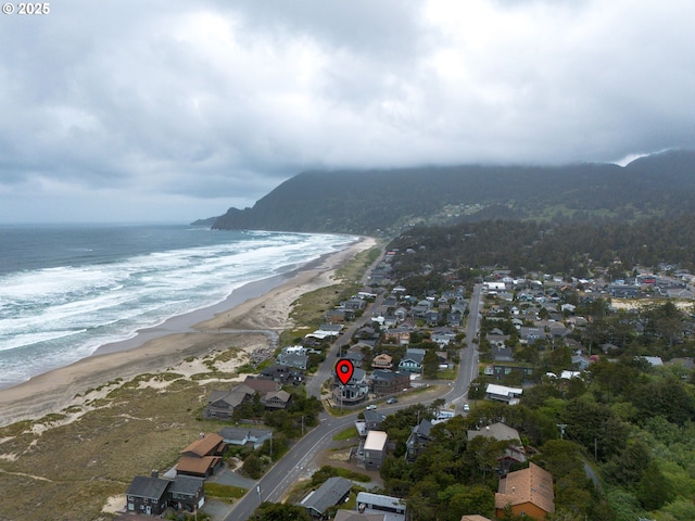 aerial overview of property's location featuring expansive beach