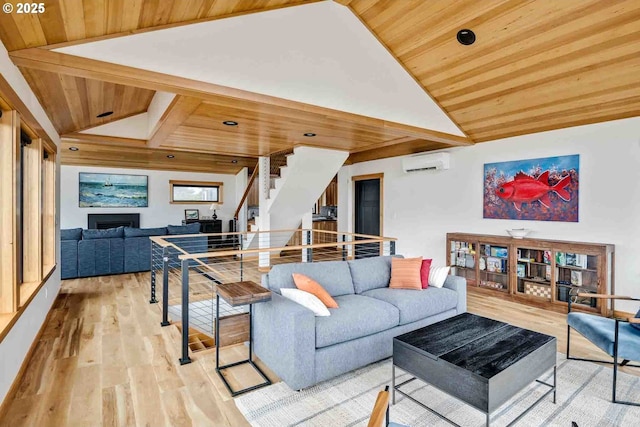 living room featuring an AC wall unit, wood ceiling, wood finished floors, lofted ceiling, and stairway