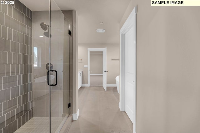 17301 SW Atfalati Ln Unit 38, Sherwood, OR 97140 - full bathroom with a stall shower, a freestanding tub, and tile patterned flooring