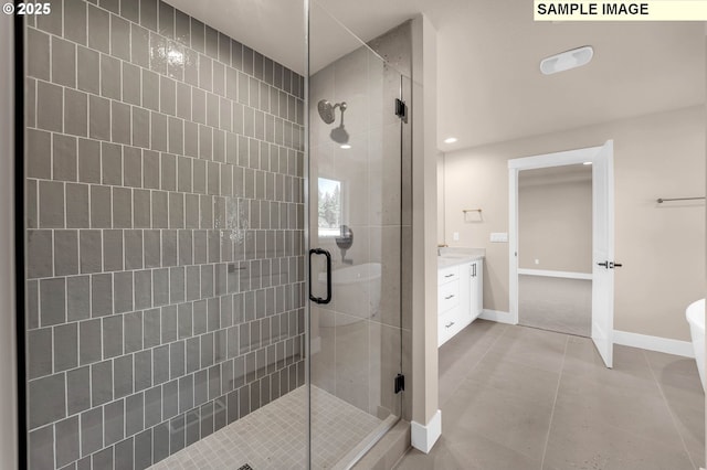 17301 SW Atfalati Ln Unit 38, Sherwood, OR 97140 - bathroom featuring a stall shower, vanity, tile patterned flooring, and recessed lighting