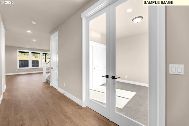 17301 SW Atfalati Ln Unit 38, Sherwood, OR 97140 - corridor with recessed lighting, wood finished floors, and french doors