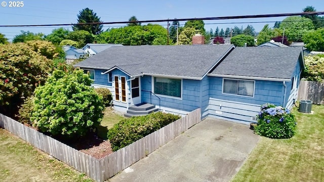 330 Maple St, Brookings, OR 97415 - view of front of house with roof with shingles and a chimney