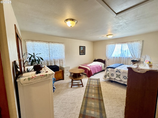 330 Maple St, Brookings, OR 97415 - bedroom featuring carpet floors and a textured ceiling