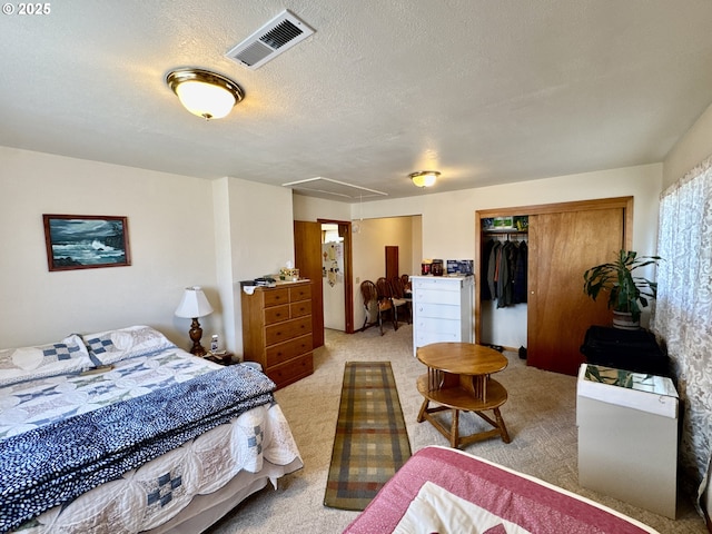 330 Maple St, Brookings, OR 97415 - bedroom featuring attic access, a closet, and light colored carpet