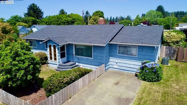 330 Maple St, Brookings, OR 97415 - view of front of house featuring roof with shingles and a chimney