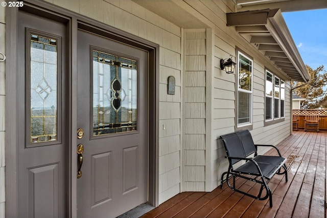 property entrance with covered porch