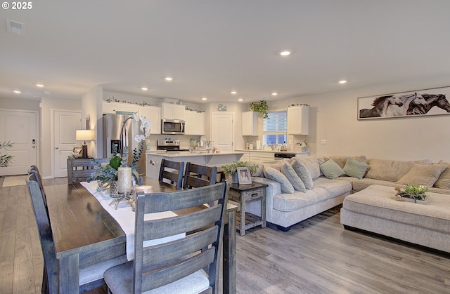 dining area featuring light hardwood / wood-style flooring