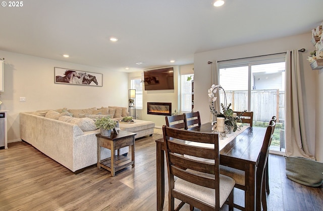 dining area with hardwood / wood-style flooring