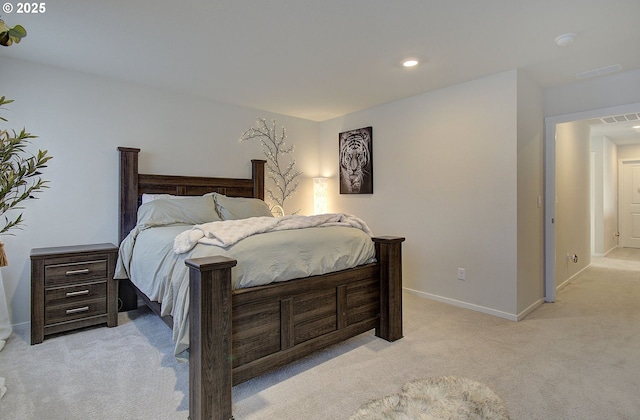 bedroom with light colored carpet