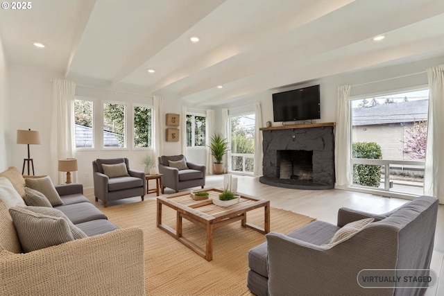 4235 SE Jackson St, Milwaukie, OR 97222 - living area featuring a fireplace, recessed lighting, beam ceiling, and light wood-type flooring