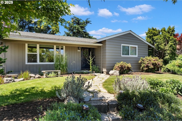 9885 SW Bonnie Brae Dr, Beaverton, OR 97008 - ranch-style house featuring a front lawn and board and batten siding