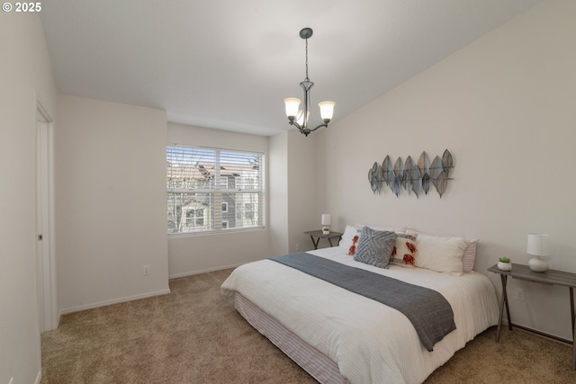 bedroom featuring carpet floors, baseboards, and a chandelier