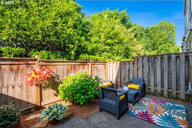 16181 SW Holland Ln, Sherwood, OR 97140 - fenced backyard with a patio area