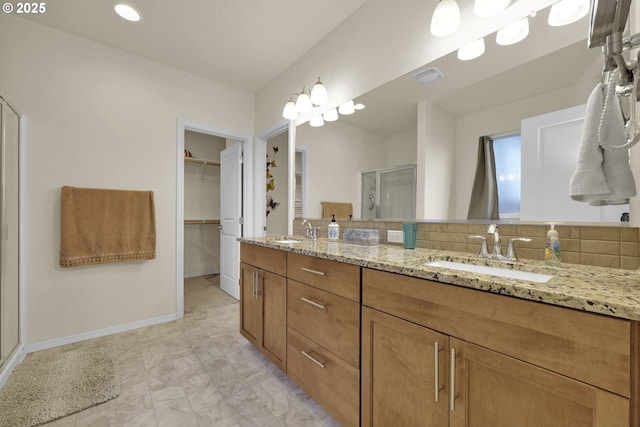 760 S 52nd St, Springfield, OR 97478 - full bath featuring a shower stall, a walk in closet, double vanity, baseboards, and recessed lighting