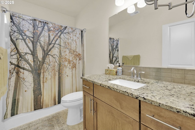 760 S 52nd St, Springfield, OR 97478 - full bath featuring vanity, toilet, backsplash, and a shower with shower curtain