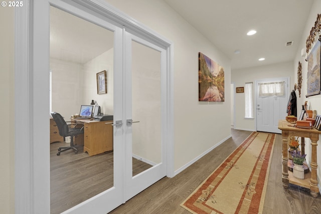 760 S 52nd St, Springfield, OR 97478 - hallway featuring french doors, a desk, recessed lighting, wood finished floors, and baseboards