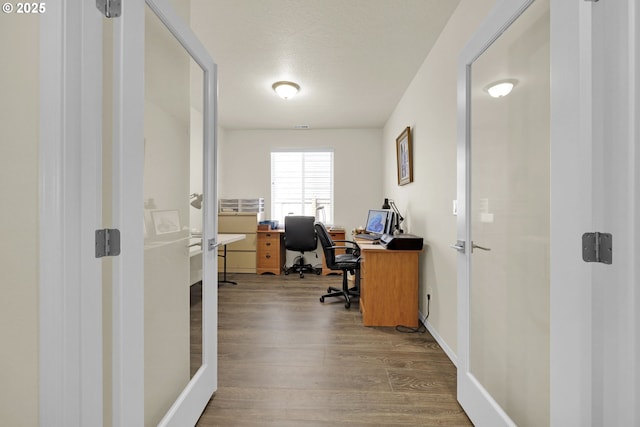 760 S 52nd St, Springfield, OR 97478 - office space with wood finished floors, french doors, a textured ceiling, and baseboards