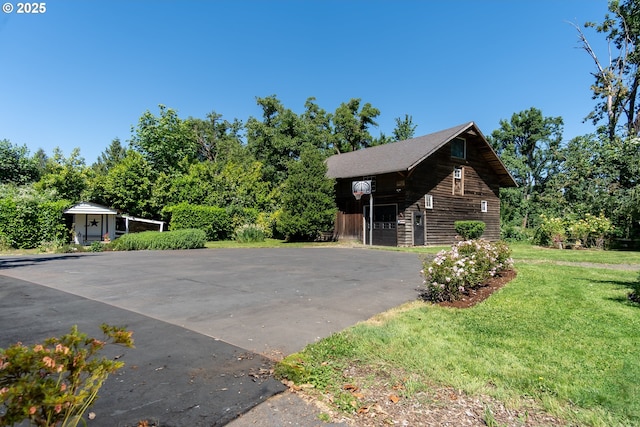 8758 Thurston Rd, Springfield, OR 97478 - view of side of home with a lawn