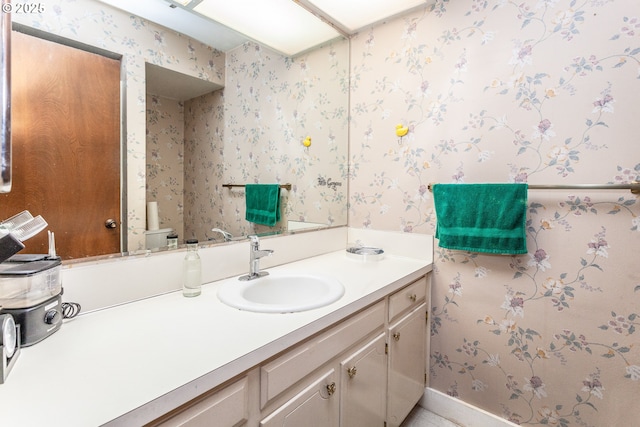 12618 NE Prescott Dr, Portland, OR 97230 - bathroom with toilet, wallpapered walls, and vanity