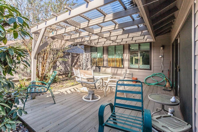 12618 NE Prescott Dr, Portland, OR 97230 - wooden terrace featuring a pergola, fence, and outdoor dining area