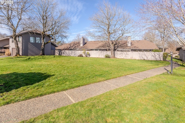 view of yard featuring fence