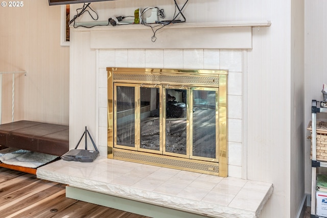 12618 NE Prescott Dr, Portland, OR 97230 - room details featuring a fireplace and wood finished floors