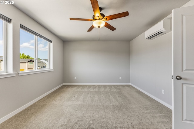 1502 Timothy St, Philomath, OR 97370 - unfurnished room featuring an AC wall unit, ceiling fan, carpet, and baseboards