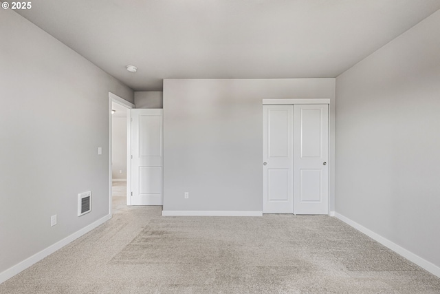 1502 Timothy St, Philomath, OR 97370 - unfurnished bedroom with carpet floors, baseboards, and a closet
