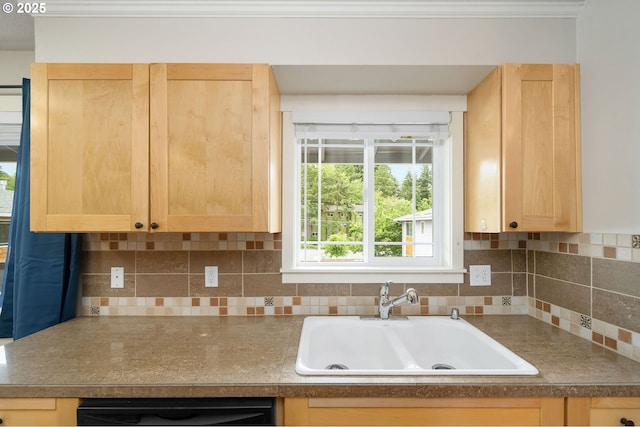 3925 SW Multnomah Blvd Unit 204, Portland, OR 97219 - kitchen featuring a sink, light brown cabinets, black dishwasher, and decorative backsplash