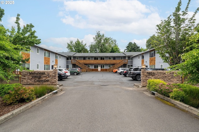 3925 SW Multnomah Blvd Unit 204, Portland, OR 97219 - view of asphalt road with stairway
