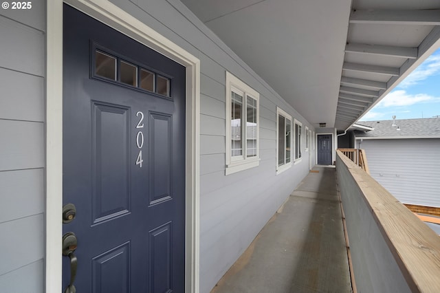 3925 SW Multnomah Blvd Unit 204, Portland, OR 97219 - view of exterior entry featuring a porch